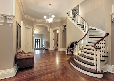 entryway with curved staircase